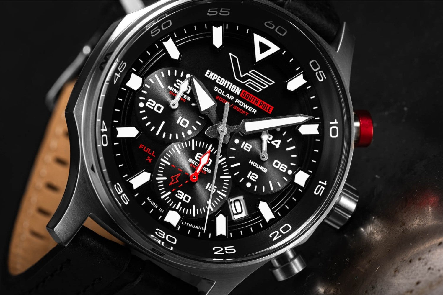Vostok Europe Expedition South Pole Solar Power watch features a rugged stainless steel case and a black dial with red accents, 200m water resistance