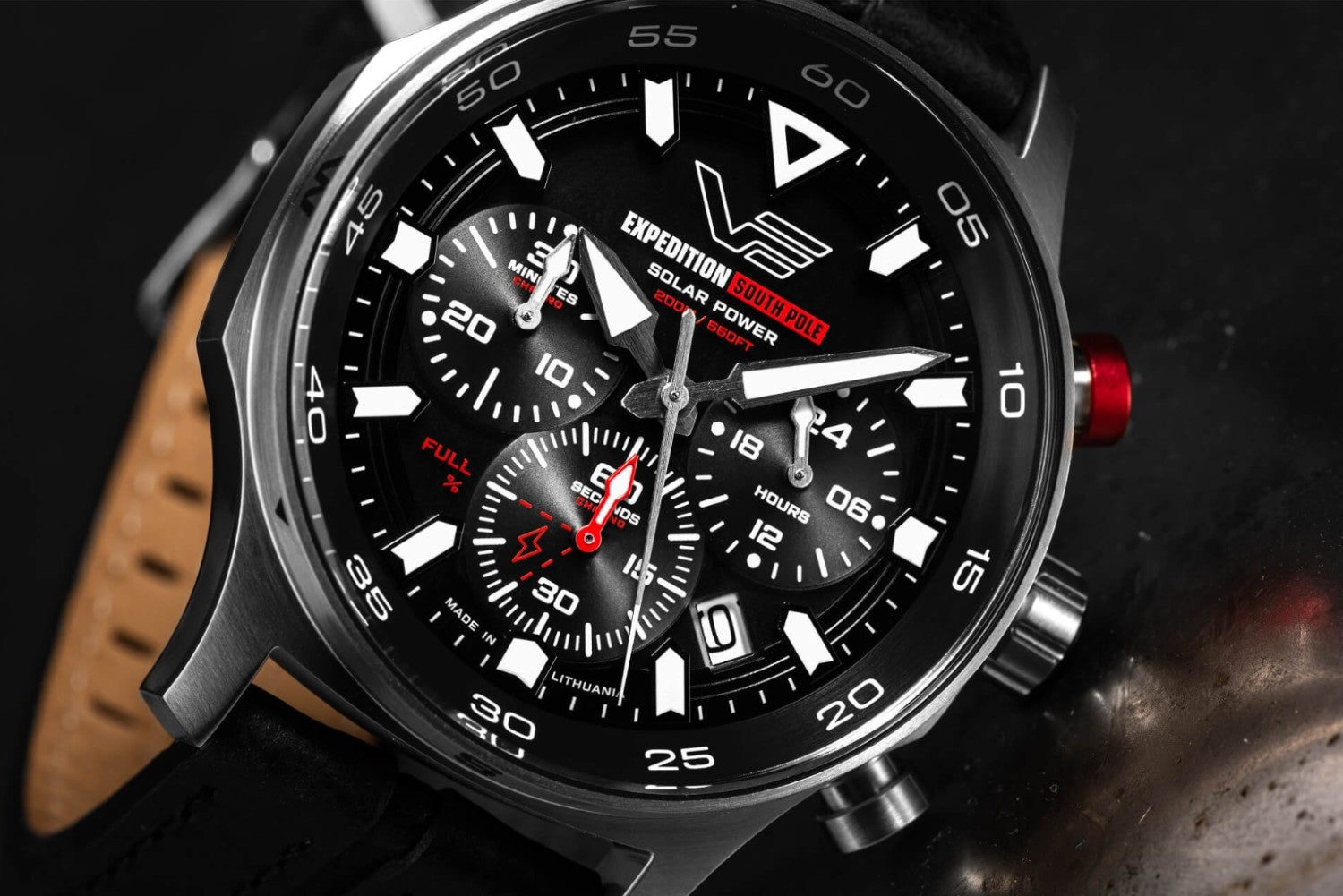 Vostok Europe Expedition South Pole Solar Power watch features a rugged stainless steel case and a black dial with red accents, 200m water resistance